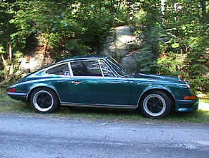 Bob Tucker
73 911 T coupe - Over the 8 years I have owned this VERY fun car it has seen many modifications. It's as much fun to work on as it is to drive. The paint work was first in '96, color is Amazon Green. The original 2.4 L CIS engine was replaced with a basically stock '78 3.0 two years later. It's current configuration is:

Engine: '78 3.0 L 9.5:1 CR, GE-60 cams, ported and polished, Weber IDA 40, MSD 6AL ignition unit with Blaster coil, although not dyno'd (yet) power output is approx 250 HP.

Transmission: 915 with updated hubs and syncs with low ratio differential, short shift kit.

Brakes: '87 Carrera calipers front and rear with cross drilled rotors and Pagid orange pads.

Suspension: 23 mm front and 30 mm rear torsion bars with adjustable spring plates and stiff bushings all around, 22 mm front and 19 mm rear anti-sway
bars.

Body: Weight 2400 lbs (that's without me), RSS front air dam, 2 front oil coolers (one fender and one front), Sparco Evo 2 drivers seat and Recaro SRD recliner both with 6 point Schroth harnesses.

Wheels: Street- Fuchs 6 and 7 X 16 with Yokohama 205/45 16 AVS Intermediate, Track Cookie Cutter 6 and 7 X 15 with Michelin 205/50-15 Sport Cup.
