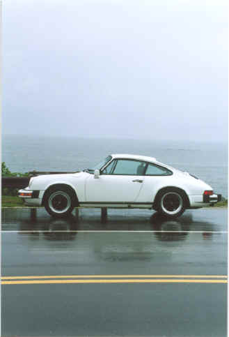 David Churcher
"For years I wanted a white Porsche and preferably from the 80s. Ellen Beck
found this one (she knew what I was looking for) ....it is a 1984 Carrera
and it has been well kept. Judy Hendrickson figures it is concours shape.

The license plate is HELMI which is my daughter's name .... she is
beautiful too." - David.

