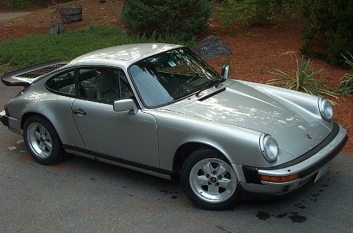 Jim Hanley
Jim's 1989 Carrera
 "I am the third owner, 110,000 miles on the clock.  The car is stock, a 25th Anniversary model, silver in and out, silver wheels and a unique console that holds 6 cassettes (no CDs in '89) and an outside temp gauge. " - Jim
