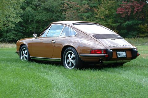 Larry & Donna Smith
"1973 911T purchased in Aug. of 2002 with 58,000 miles.
Upgraded after purchase with Stainless Steel heat exchangers,
Carrera chain tensioners and Pertronix Igniter to eliminate the distributor points.
Really a fun car to drive, it now has 70,000 miles on it."
 - Larry Smith
